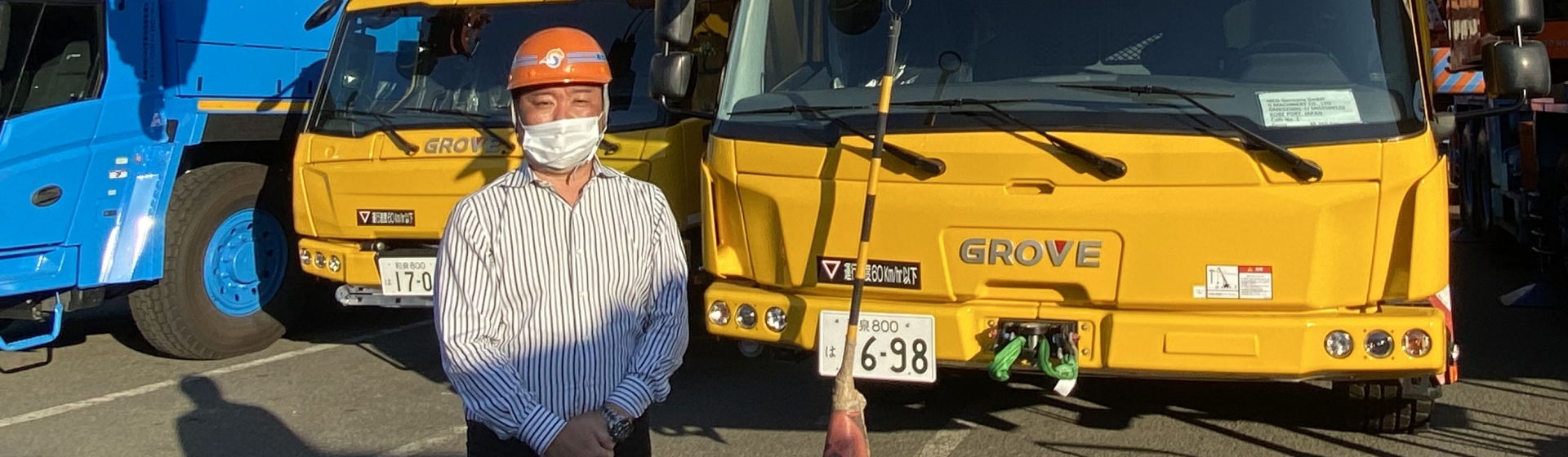 Shohei Konno, GM and president at G Machinery, with the latest Grove arrivals in Japan. Manitowoc-appoints-G-Machinery-as-new-Grove-distributor-in-Japan-02.jpg
