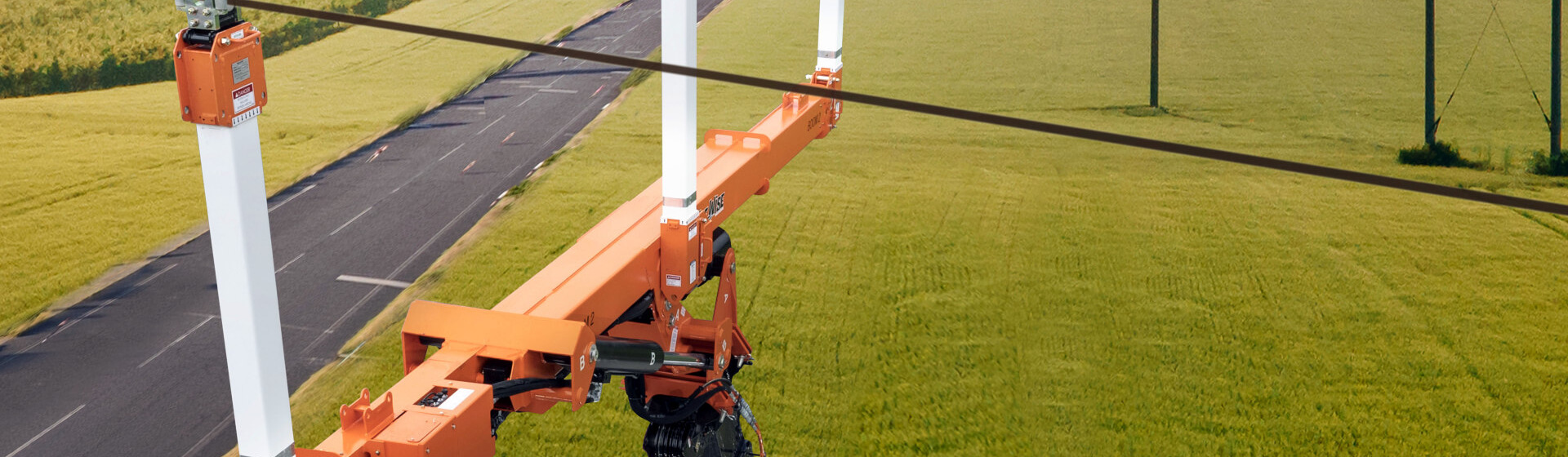 The National Crane NBT60XL matched with the LineWise TLL-2000 Series 3 Triple Line Lifter expands the scope of work for electric utility contractors. National-Crane-and-LineWise-team-up-for-high-voltage-power-line-work-1.jpg