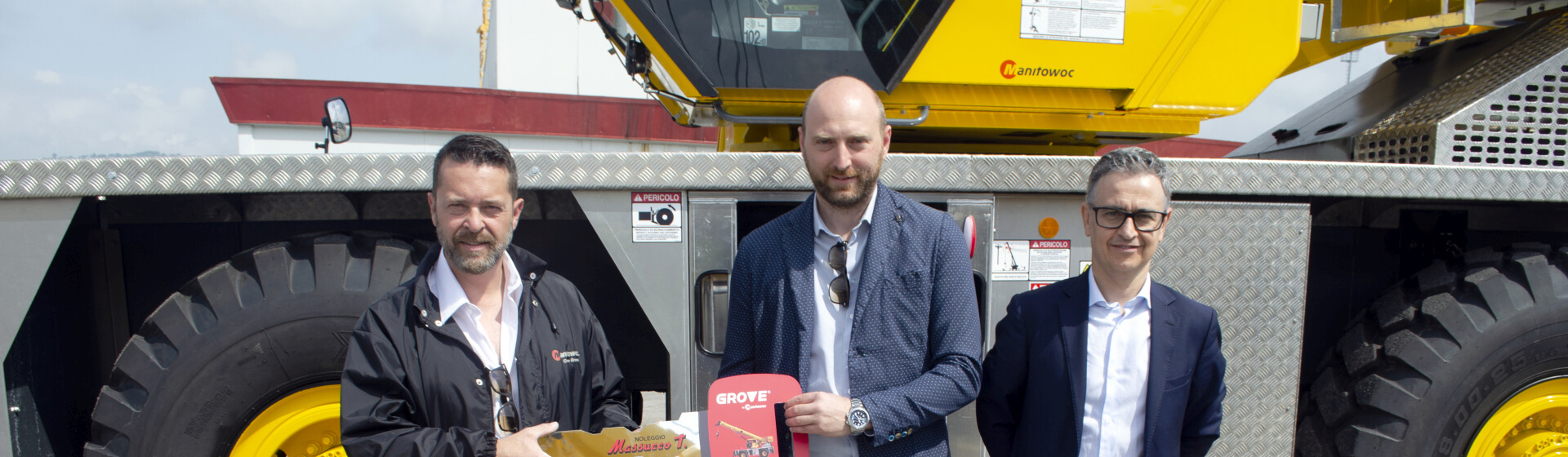 Left to right: Roberto Zucchi, Manitowoc; Roberto Borgogno, Massucco T.; and Federico Lovera, Manitowoc. Italian-rental-giant-Massucco-T-buys-three-Grove-GRT655L-rough-terrain-cranes-1.jpg