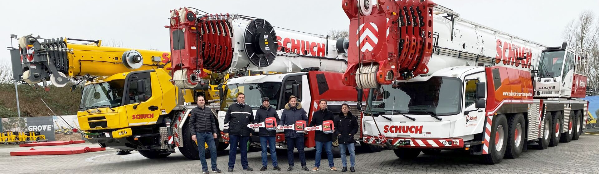 Left to right: Lukas Brämer (KranAgentur Werner), Stefan Schuch (Schuch), Christopher Schuch (Schuch), Sebastian Schuch (Schcuch), Tim Schuch (Schuch), Matthias Gries (KranAgentur Werner) Schuch-Heavylift-Corporation-acquires-eight-new-Grove-mobile-cranes-1.jpg