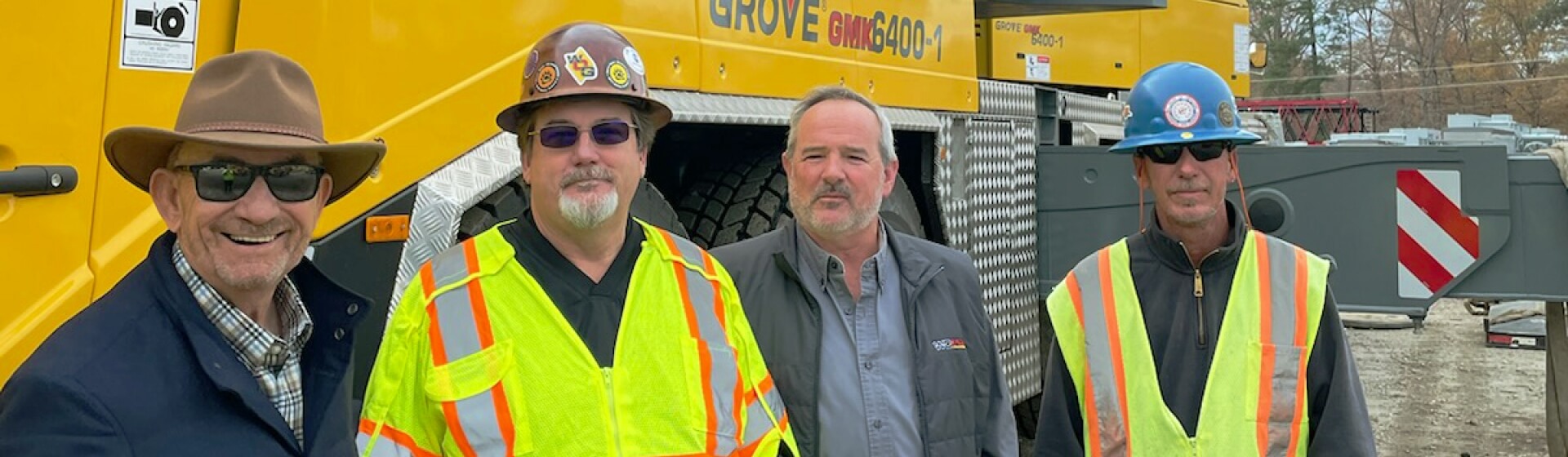From left to right: Bill Grubb, owner of W.O. Grubb Crane Rental, poses with Dean Spruill, regional operations manager; Doug Adkins, director of fleet operations; and Kris Becker, crane operator. WO-Grubb-enhances-operations-with-its-new-Grove-GMK6400-1.jpg