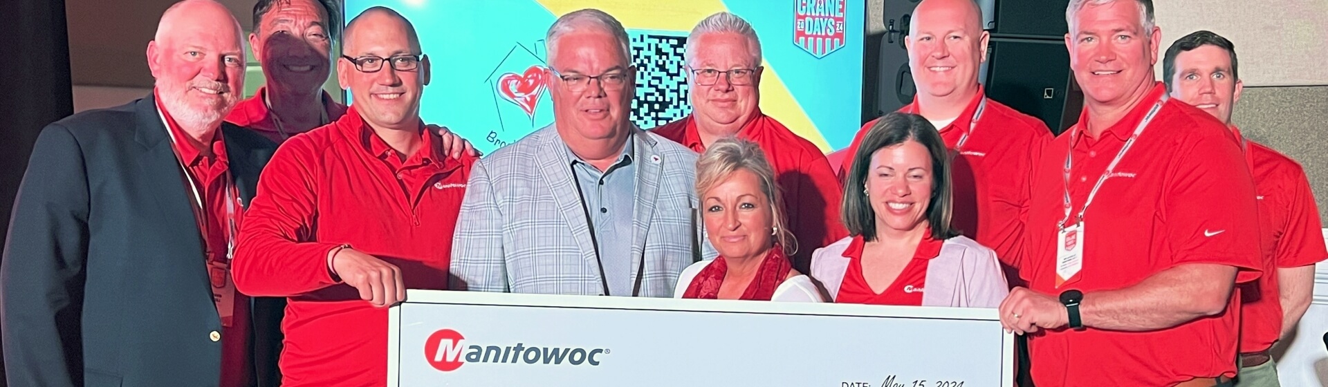 From left: David Hull, Ion Warner, Aaron Ravenscroft, Manitowoc; Kevin and Dana Simmers, Brooke’s House; Les Middleton, Jennifer Peterson, James Cook, Brian Regan and Chase Seely, Manitowoc. Brookes-House-receives-150K-donation-from-Manitowoc-and partners.jpg