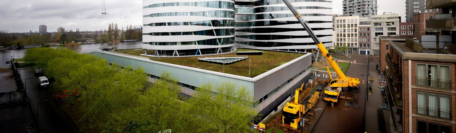 The GMK5250XL-1 used its full 78.5 m main boom and 17.8 m bifold swingaway jib to install parts for an elevator fire safety system at an office in downtown Amsterdam. Tall-order--Grove-GMK5250XL-1-called-in-for-high-rise-project-in-downtown-Amsterdam-3.jpg