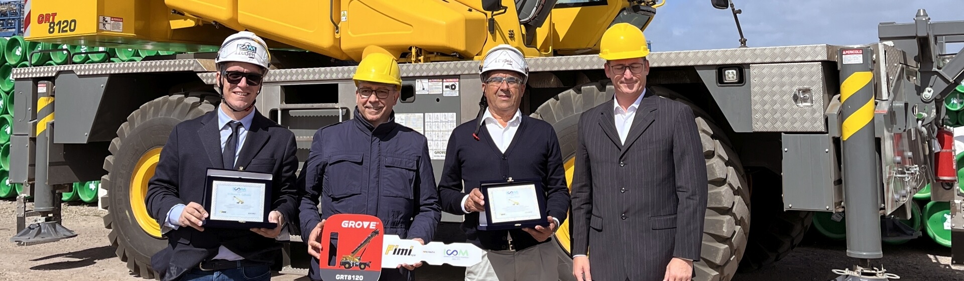From left to right: Alessandro Calledda, general manager at Nuova ICOM; Enrico Angiolini, sales director at Manitowoc Italy; Fabio Pistis, sales director at Nuova ICOM; David Semple, SVP Mobile at Manitowoc. Nuova-ICOM-deploys-new-Grove-GRT8120-for-industrial-plant-build-at-major-Italian-seaport-1.jpg