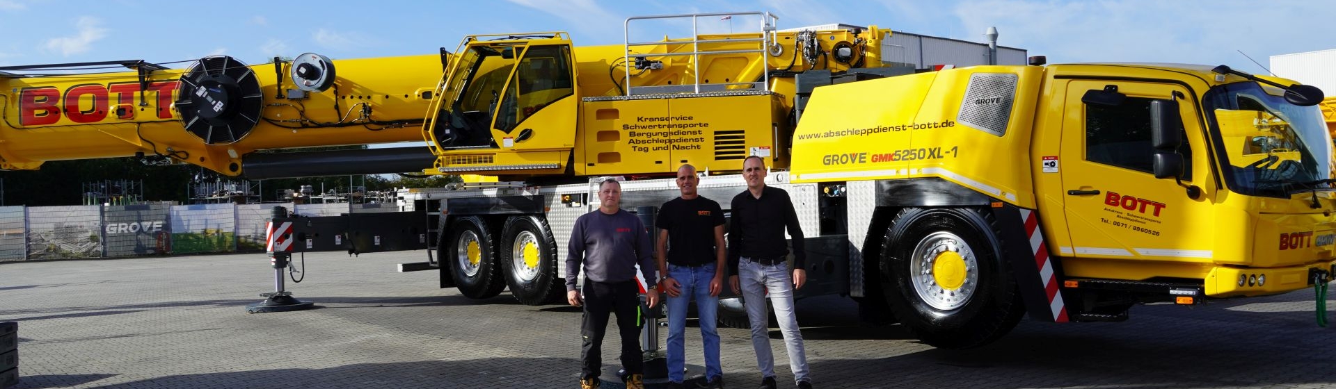 From left to right: Wolfgang Hansen, Bott Group; Daniel Matheis, Bott Group; and Lukas Brämer, KranAgentur Werner. Bott-Group-welcomes-its-30th-Grove-Mobile-Crane--A-GMK5250XL-1-joins-the-fleet-01.jpg