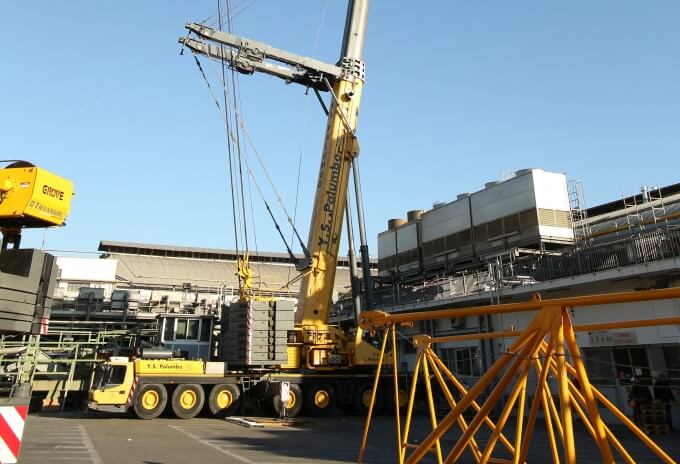 Largest-Grove-all-terrain-crane-assembles-Potain-tower-crane-for-roof-repairs-at-Italian-tomato-processing-plant-04.JPG
