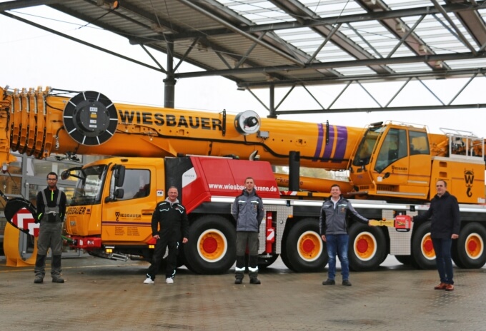 (from right) Lukas Brämer, sales representative for KranAgentur Werner; Felix Wiesbauer and the Wiesbauer crane operators Ralf Hoffman, Samuele Polidori and Jannik Weigle celebrate the handover of the new GMK5150L. Wiesbauer-strengthens-fleet-with-new-Grove-GMK5150L-all-terrain-crane-1.jpg