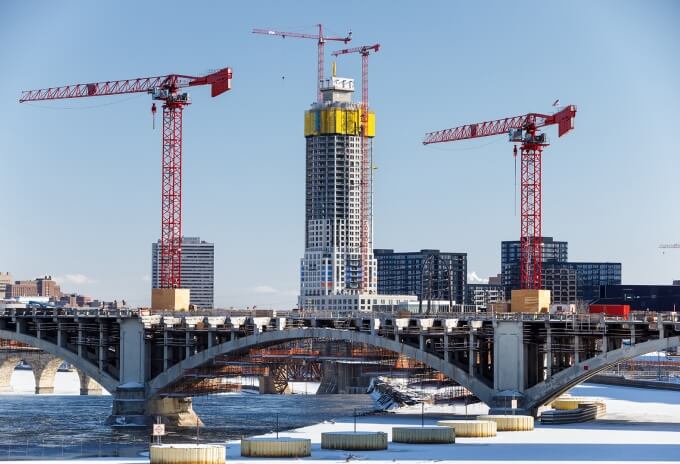 Four Potain MDT tower cranes become integral part of famous Minneapolis bridge’s history — and also its structure (Image 1) E Four-Potain-MDT-tower-cranes-become-integral-part-of-famous-Minneapolis-bridge-s-history-and-also-its-structure-01.jpg