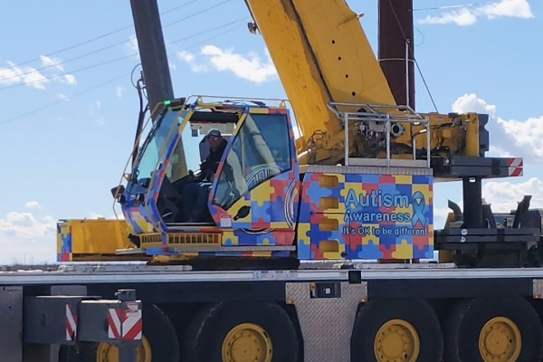 Nimble-Crane-to-shine-light-on-Autism-Awareness-Month-with-vibrant-crane-wrap-01.jpg