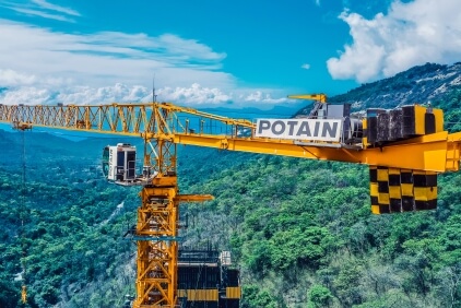 Four-Potain-MCT-385-topless-cranes-deliver-record-breaking-Indian-bridge-project-01.jpg